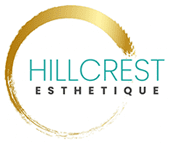 A gold circle with the words hillcrest esthetique in it.