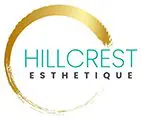 A gold circle with the hillcrest esthetique logo.